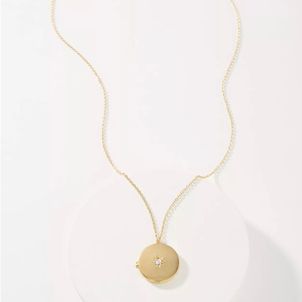 Brand new Anthropologie 14k gold plated North Star locket necklace.